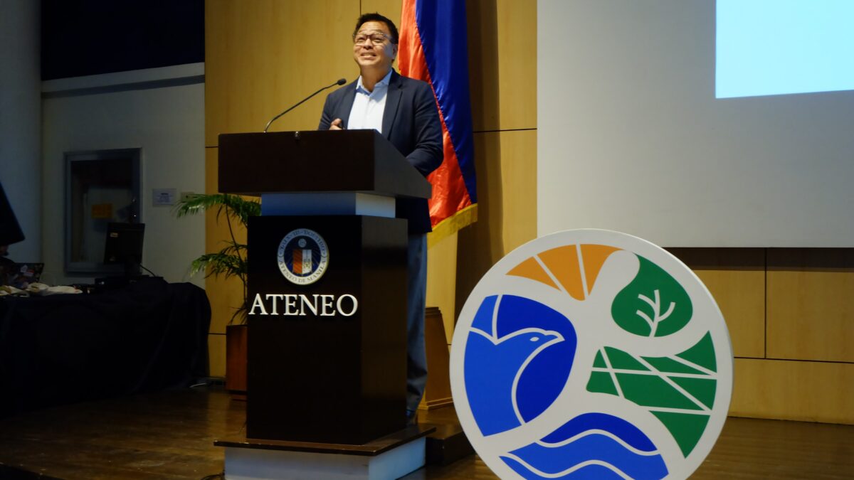 Ned Legaspi presents on culturally intelligent storytelling and climate communication at the 2025 AUN-EEC Conference at Ateneo de Manila University.