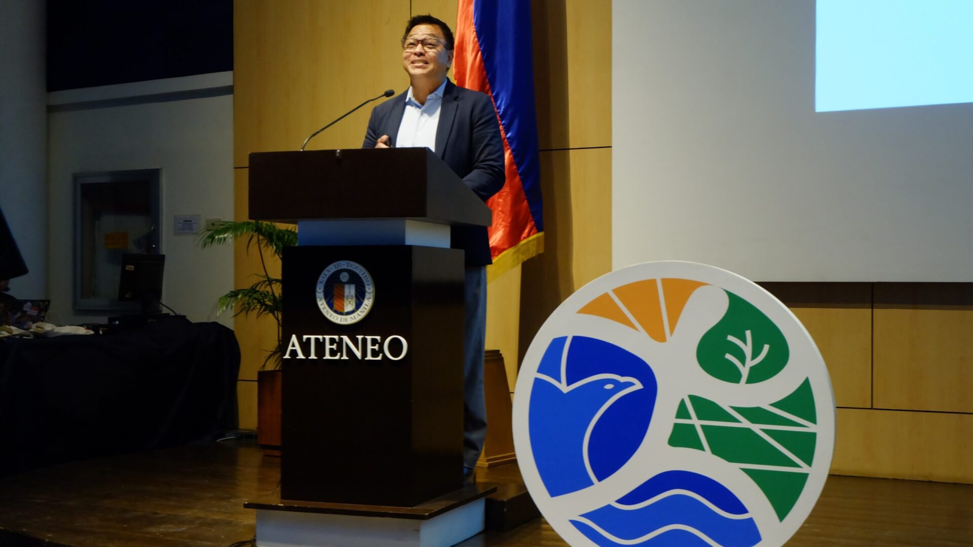 Ned Legaspi presents on culturally intelligent storytelling and climate communication at the 2025 AUN-EEC Conference at Ateneo de Manila University.
