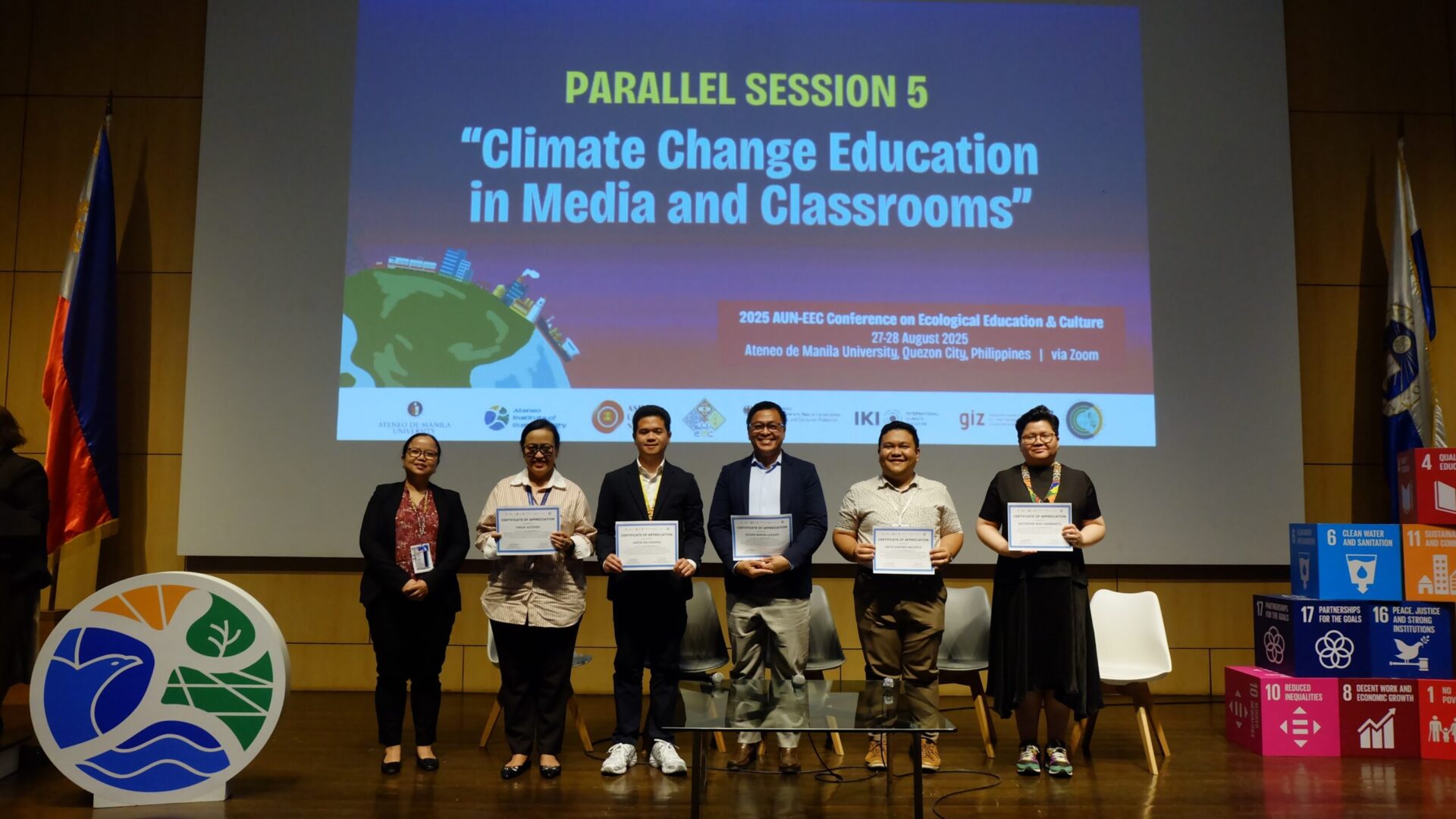 Presenters and session participants pose for a group photo after the Climate Change Education in Media and Classrooms parallel session at the 2025 AUN-EEC Conference.