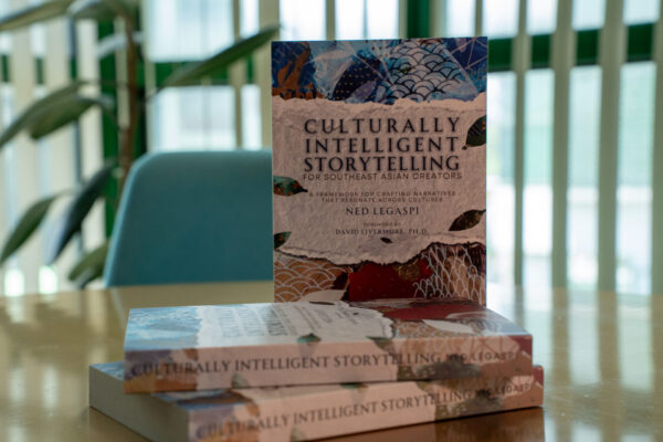 Copies of Culturally Intelligent Storytelling for Southeast Asian Creators displayed before the Philippine book launch at Ateneo de Manila University.