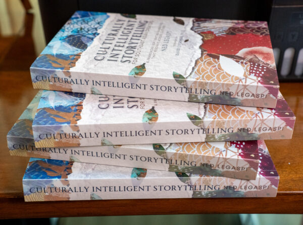 Copies of Culturally Intelligent Storytelling for Southeast Asian Creators displayed ahead of the Philippine launch at Ateneo de Manila University.