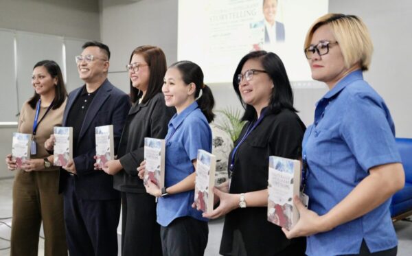 Panelists holding copies of Culturally Intelligent Storytelling at the Philippine launch, as featured in Village Connect's recap